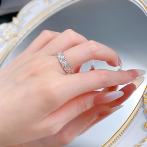 Close-up of S925 silver ring with brushed texture and handcrafted woven texture details