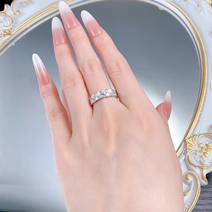 Detail of double-row eternity band ring in S925 silver with sparkling crystals