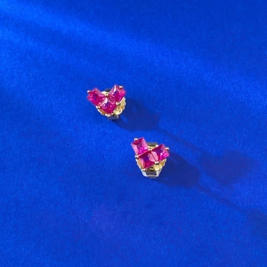 Sparkling pink square-cut gemstone stud earrings in elegant gold claw settings