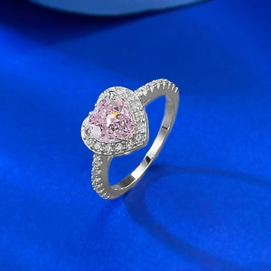 S925 silver ring featuring a heart-shaped pink gemstone with a halo diamond setting