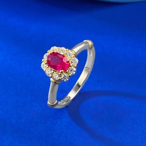 Detail of S925 silver vintage flower ring featuring oval red ruby and diamond halo