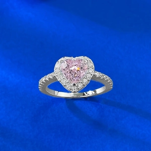 Detail of S925 silver ring featuring heart-cut pink gemstone and pavé settings