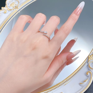 Close-up of S925 sterling silver water drop ring with zircon on hand model