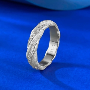 S925 sterling silver ring with twisted woven texture and pavé set cubic zirconia