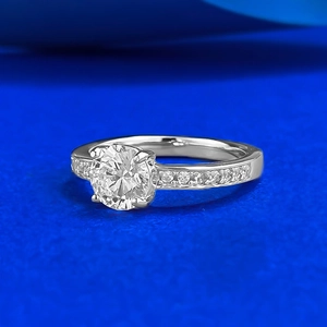 Macro shot of S925 sterling silver four-prong ring with a 6.5mm round brilliant diamond