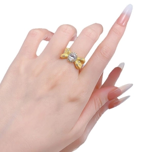 S925 silver brushed gold bow ring with oval centerpiece and sparkling micro-inlays