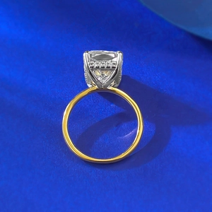 Radiant cut square clear gemstone ring with two-tone gold and silver band setting
