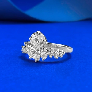 S925 sterling silver crown ring set with a large round cubic zirconia on a blue base