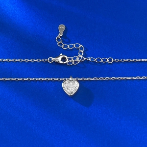 Detail of S925 sterling silver stamp on heart pendant necklace with lobster clasp