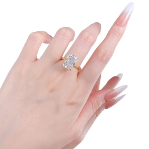 S925 silver gold-plated ring with large rectangular ice-cut clear stone on hand