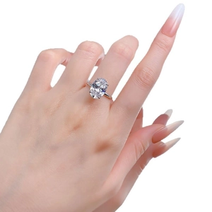 S925 sterling silver four-prong oval cut solitaire engagement ring worn on hand