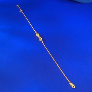 Adjustable S925 silver gold-plated Vajra bracelet with lobster clasp on blue background