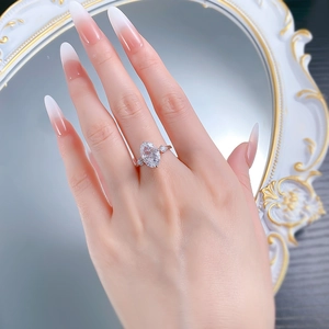 Close-up of S925 sterling silver ring with oval ice-flower cut high carbon diamond
