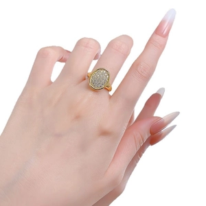 Gold plated S925 silver oval ring with micro-paved cubic zirconia on model finger