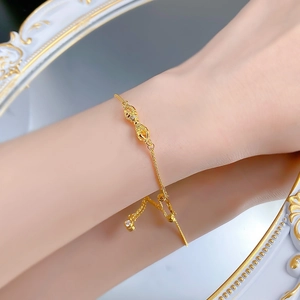 Close-up of S925 silver gold-plated Vajra bracelet with diamonds on a female wrist