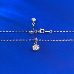 S925 sterling silver necklace with a 5.0mm round bezel-set solitaire diamond pendant