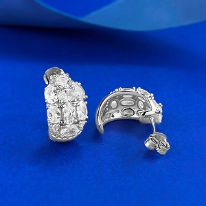 S925 sterling silver hoop earrings featuring three rows of oval-cut sparkling zircons
