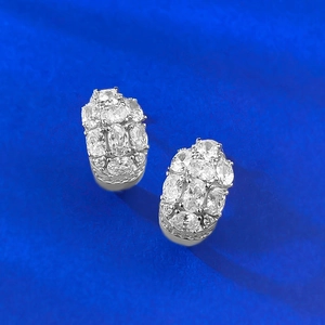 Vintage S925 silver earrings featuring three rows of cluster oval cubic zirconia stones