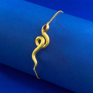 S925 silver snake bracelet with brushed gold finish and teardrop red gemstone detail