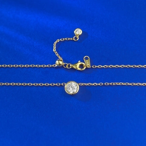 Gold plated S925 silver necklace featuring a classic bezel-set round white zircon pendant