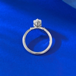 S925 sterling silver rope twist ring featuring a marquise cut stone on a navy background