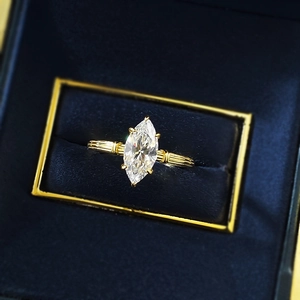 Retro S925 silver ring with marquise cut stone and fluted band in gold finish