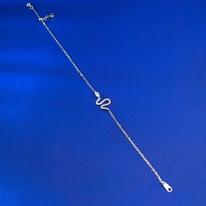 Close-up of S925 sterling silver snake bracelet with sparkling cubic zirconia inlay detail