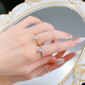 Macro view of marquise-cut stone ring with detailed rope texture band and polished finish
