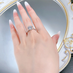Close-up of S925 silver ring featuring a twisted band and a six-prong set round zircon