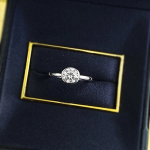 Classic S925 silver 6mm round solitaire ring in bezel setting on blue velvet box