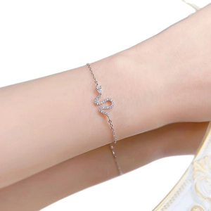 Elegant S925 silver snake bracelet with sparkling cubic zirconia pavé and pear-cut stone
