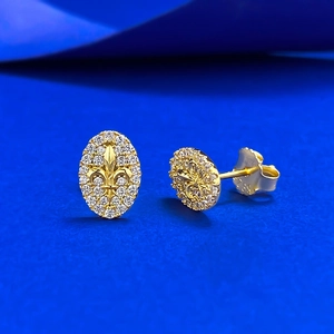 Elegant gold oval Fleur-de-lis stud earrings with sparkling pave-set cubic zirconia accents