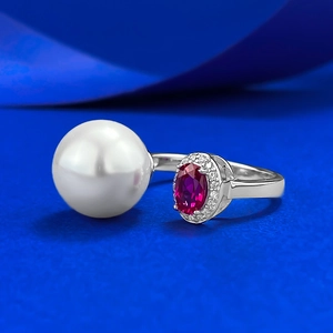 S925 silver open ring featuring a 12mm white pearl and a red oval gemstone with zircon halo