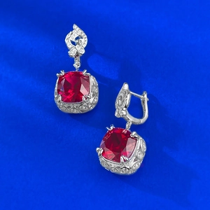 S925 sterling silver earrings with red cushion cut gemstone and intricate filigree detail