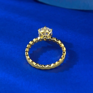 Classic gold S925 silver engagement ring with round brilliant cut stone and textured band