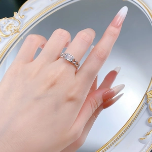Close-up of S925 silver chain ring featuring a large rectangular cubic zirconia stone