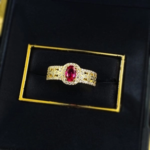 Vintage style gold-plated S925 silver ring with oval ruby and hollow band design