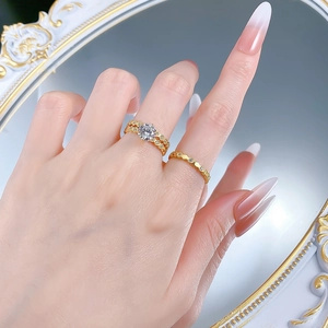 Detailed view of 18K gold-plated S925 silver rings set with sparkling zircon stones