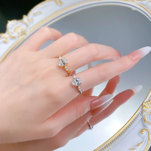 Macro detail of gold and silver plated S925 rings with oval and marquise stones