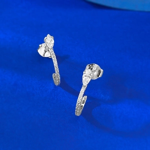 Close-up of S925 sterling silver curved stud earrings with marquise-cut stone details