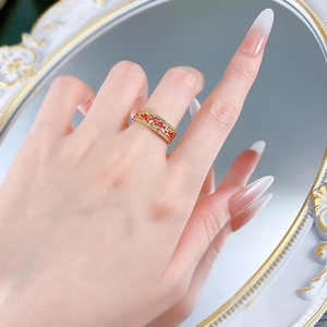 Macro shot of S925 silver ring with red enamel patterns and fine zircon inlay detail