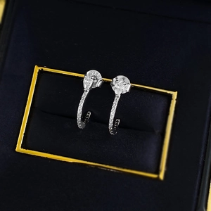 Elegant S925 sterling silver curved stud earrings with teardrop zircons and pavé settings