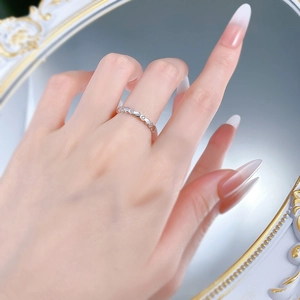 Close-up of S925 sterling silver honeycomb ring with diamonds on a hand