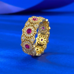 Exquisite S925 sterling silver ring with hollow flower patterns and red gemstones