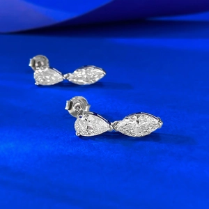 S925 sterling silver stud earrings featuring pear and marquise cut zircon gemstones