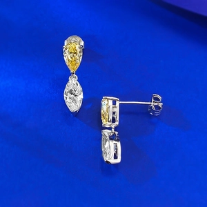 Elegant S925 silver studs featuring pear-cut yellow and marquise white cubic zirconia