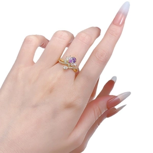 Elegant S925 silver ring with purple pear-shaped gemstone and cubic zirconia accents