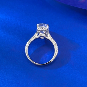 Elegant S925 sterling silver ring with large oval cut sparkling stone on blue background