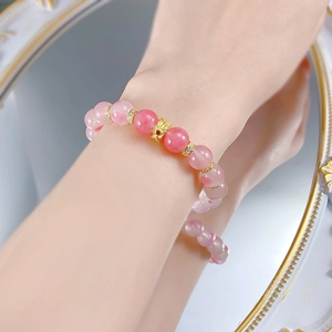 S925 silver bracelet with 9mm cherry blossom pink crystal beads and golden feather charm