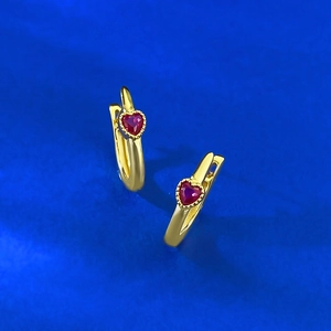 Elegant S925 gilded heart-shaped ruby earrings with vintage beaded edge on blue background